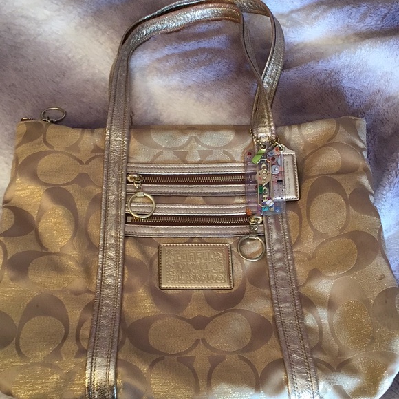Coach Handbags - Coach Gold Poppy Purse (Used)